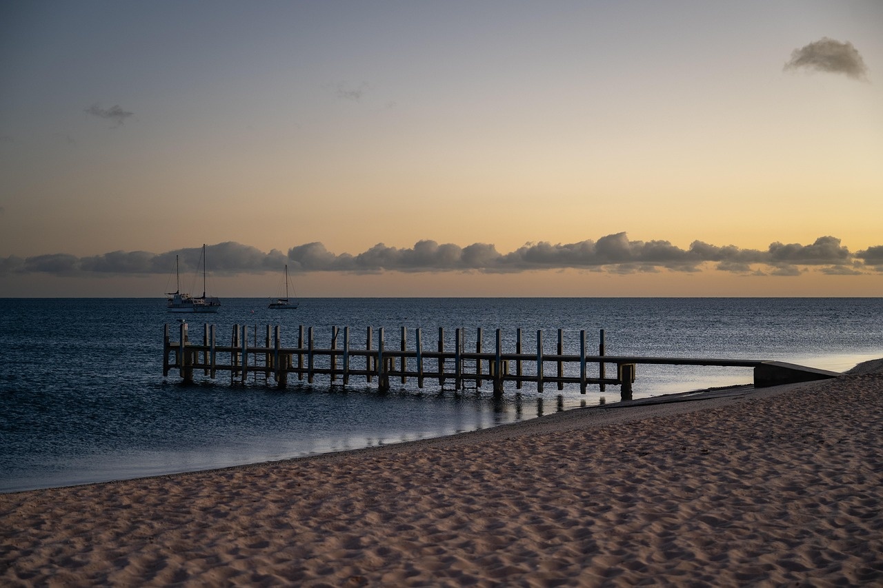 Sunset over a quiet coastal pier