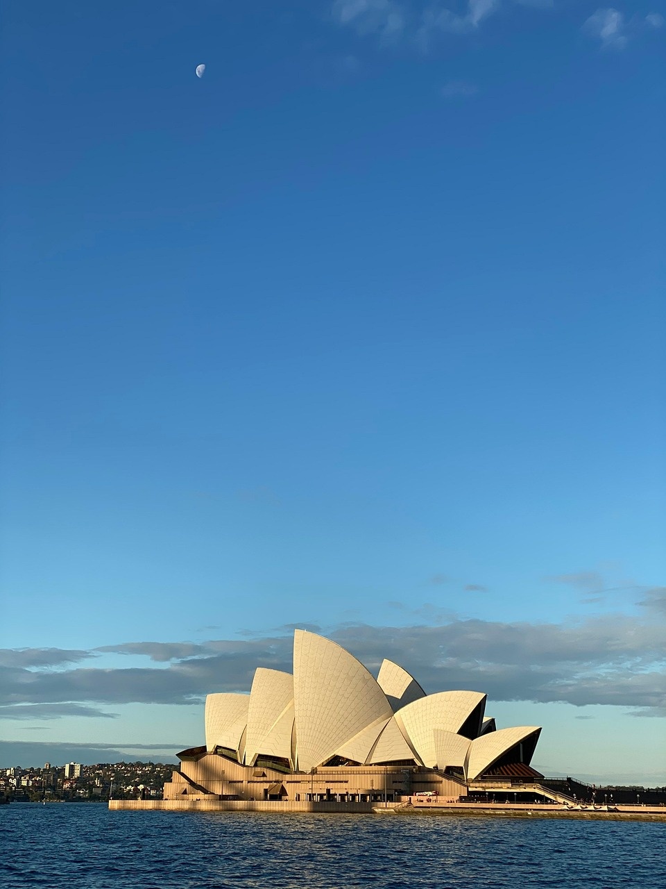 Sydney Opera House and harbour at dusk